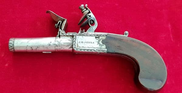 A good flintlock pocket pistol by J. G. Jones. Circa 1800. Good condition. Ref 1808.